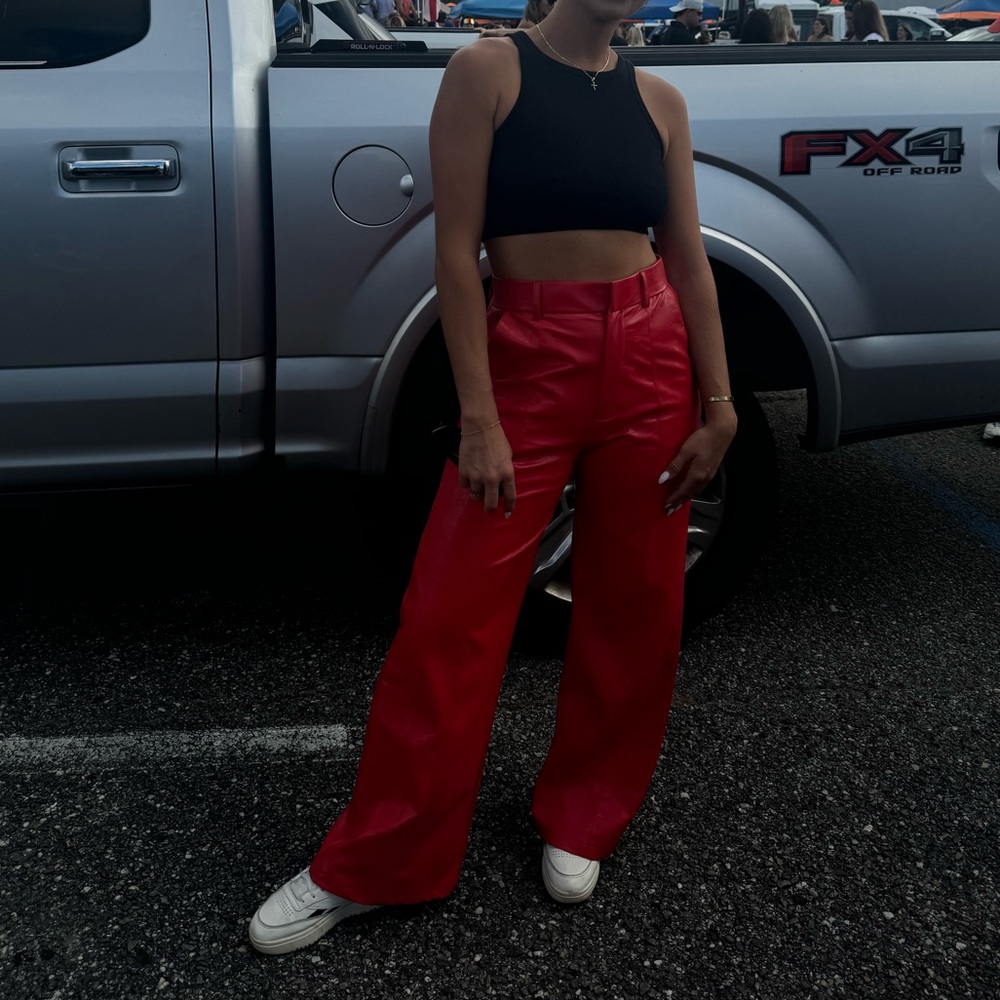 Line and dot leather pants